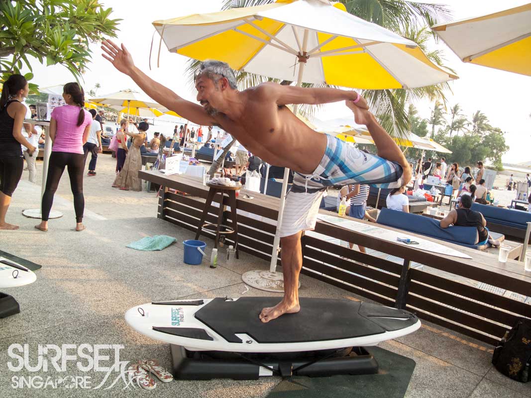 Surfset Soulscape 2014 man in yoga pose on board