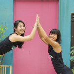 Shuyi and Nat doing Yoga Moves in Katong