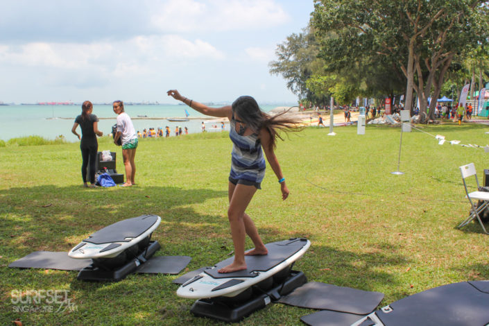 Surfer babe on surf board