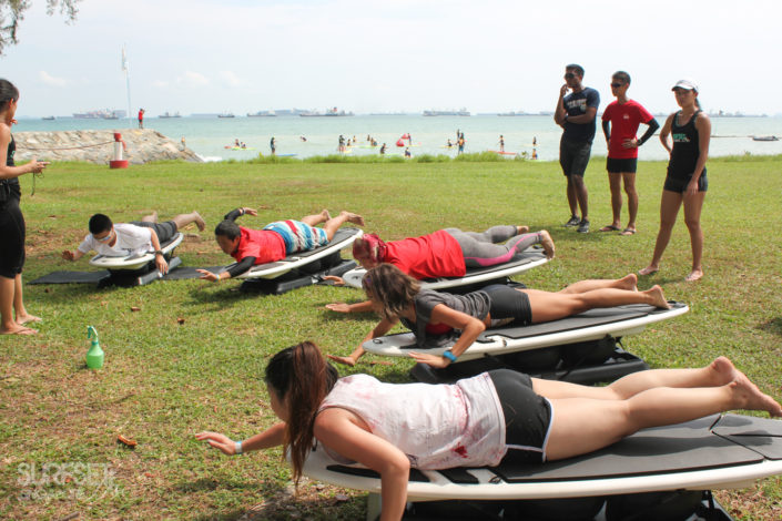 Group class doing paddling