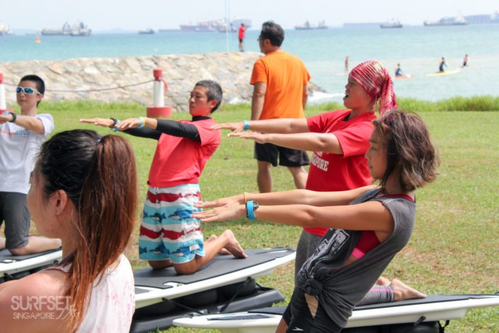 Participants working their core muscles